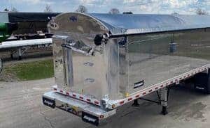 Roll Rite tarp arm and motor on Trison Side Roll Tarp System on Stargate trailer